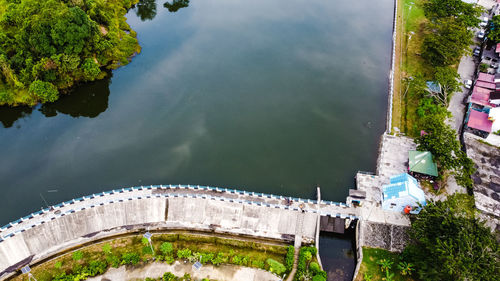 High angle view of river amidst buildings