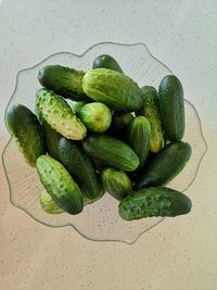 High angle view of vegetables cucumbers on table