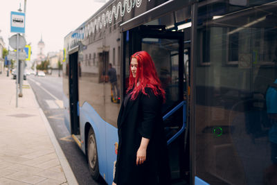 Rear view of woman walking in city