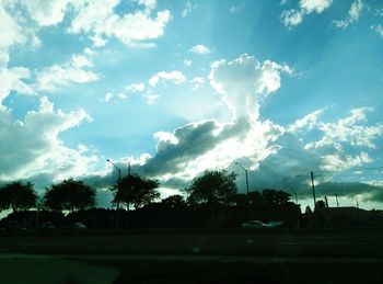 View of road against cloudy sky