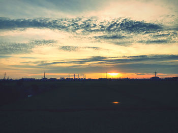 Scenic view of dramatic sky during sunset