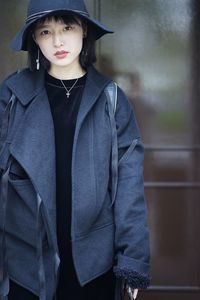 Portrait of young woman wearing sunglasses