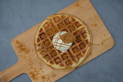 High angle view of bread on cutting board