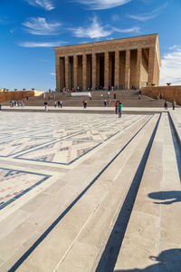 Group of people in front of historical building