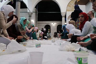 Friends sitting on table