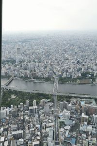 Aerial view of cityscape and river