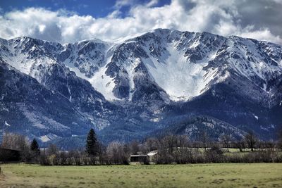 Scenic view of snowcapped mountains against sky