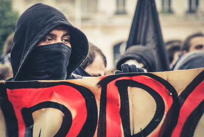 People holding poster during protest