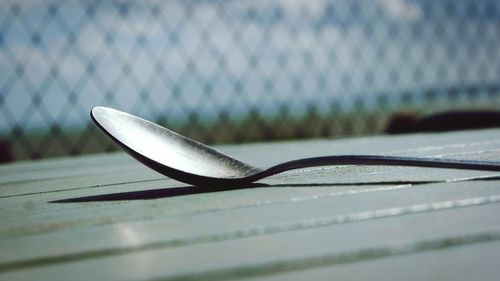 Close-up of metal on table