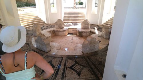 High angle view of woman sitting on table