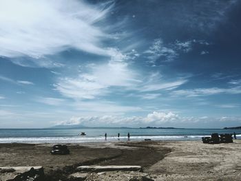 Scenic view of sea against cloudy sky