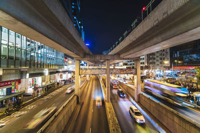 Traffic light trails on road at night