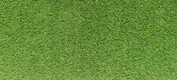 Artificial old grass on floor top view