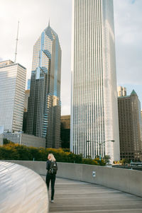 Woman looking at city skyline