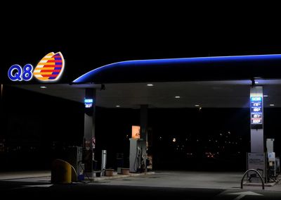 Illuminated lights at store at night