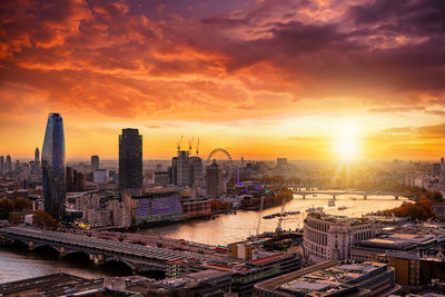 High angle view of buildings against sky during sunset