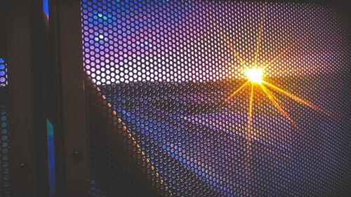 Low angle view of illuminated ceiling