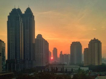 View of cityscape at sunset