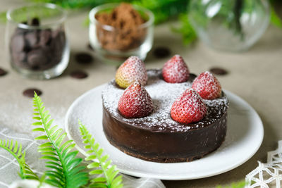 Close-up of strawberries in plate on table