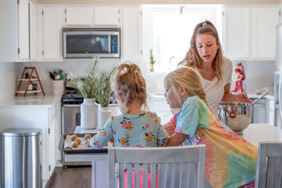 Women in kitchen at home