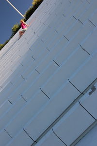 Low angle view of person against sky