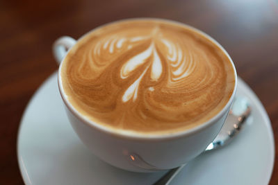 High angle view of cappuccino on table