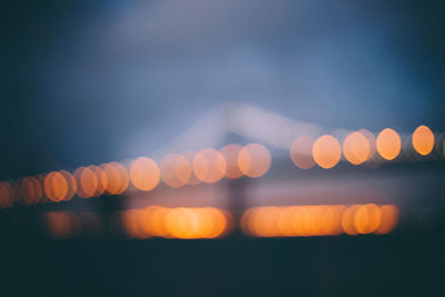 Defocused image of illuminated lights at night
