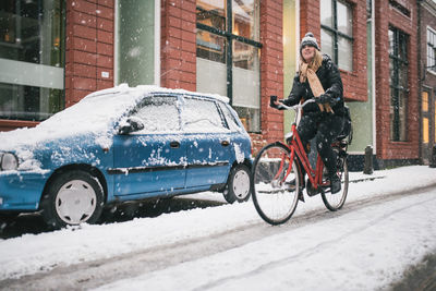 Bicycles on snow covered city