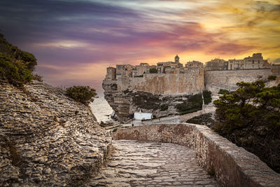 Old ruins against sky during sunset