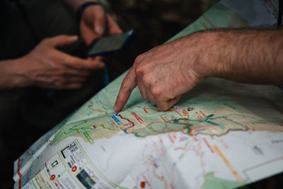 Close-up of man using mobile phone