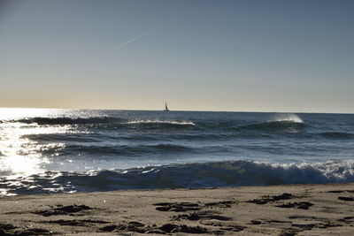 Scenic view of sea against clear sky