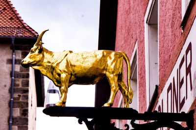 Close-up of statue against sky