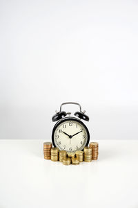 Close-up of clock against white background