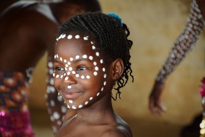 Close-up portrait of smiling girl