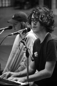 Midsection of child playing piano