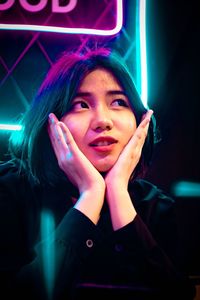 Portrait of smiling young woman