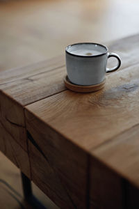 Close-up of coffee on wooden table