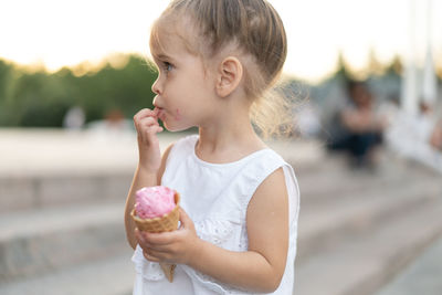 Girl holding ice cream