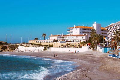 Beach of the touristic village of nerja, costa del sol, province of málaga, spain.