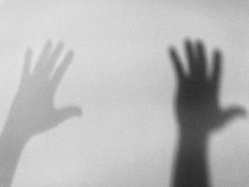 Close-up of shadow on hand