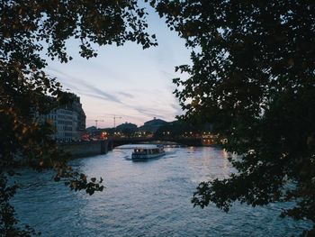 River amidst trees against sky