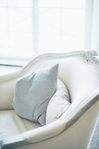 Close-up of sofa on bed at home