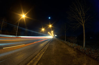 Light trails on road at night