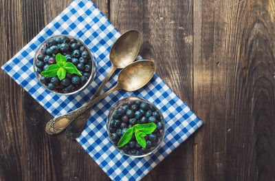 High angle view of fruits in plate on table