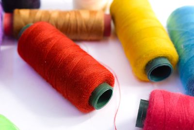 Close-up of multi colored pencils on table