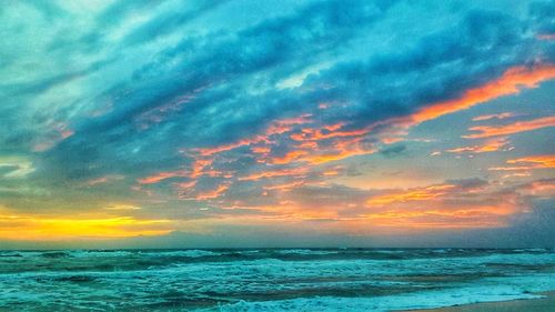 Scenic view of sea against sky during sunset