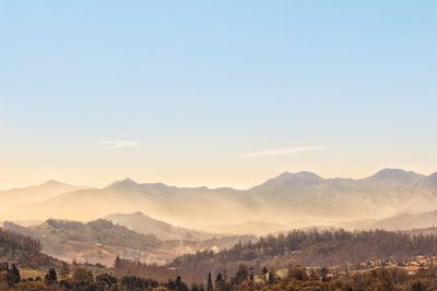 Scenic view of mountains against sky during sunset