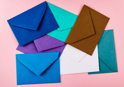 High angle view of multi colored paper on table