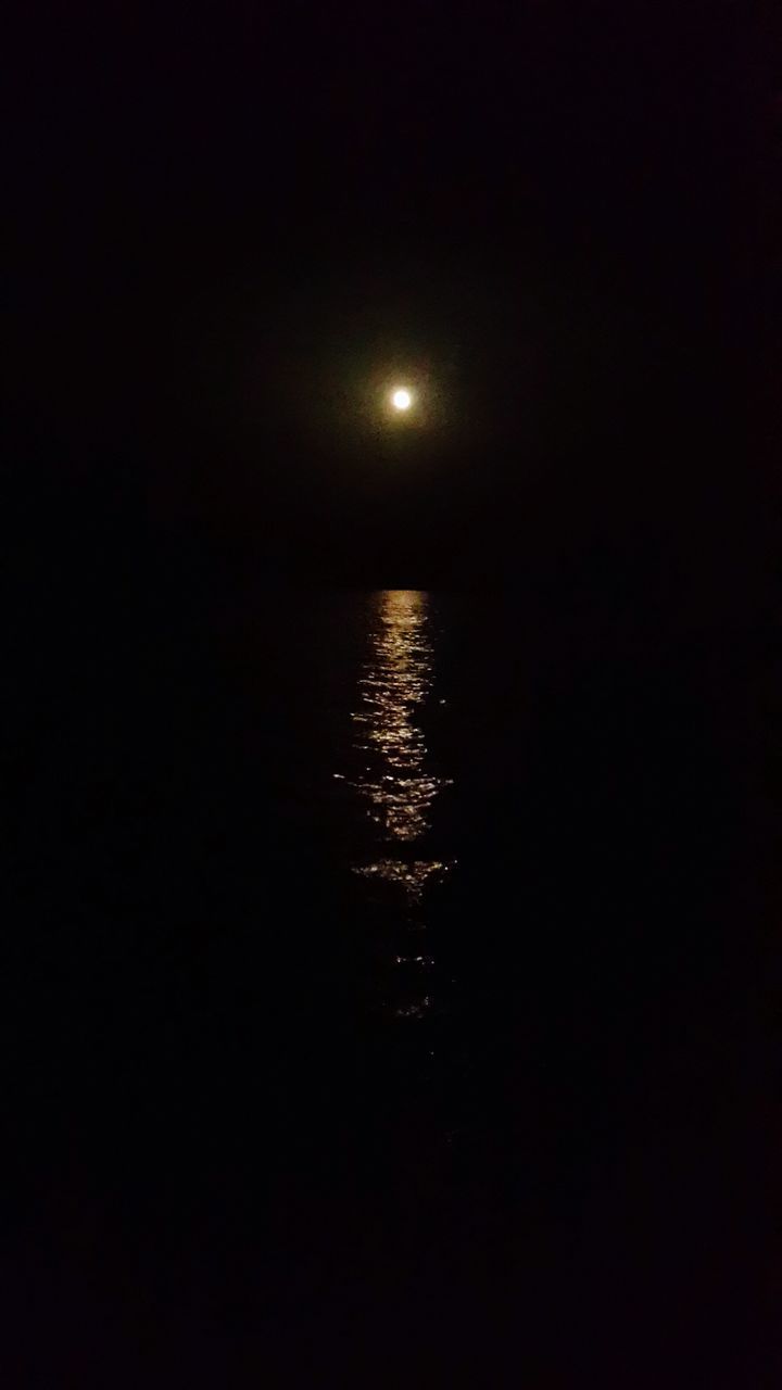 night, water, tranquility, moon, tranquil scene, reflection, scenics, illuminated, copy space, beauty in nature, waterfront, dark, clear sky, nature, idyllic, sky, astronomy, silhouette, no people, rippled