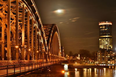 View of illuminated bridge at night